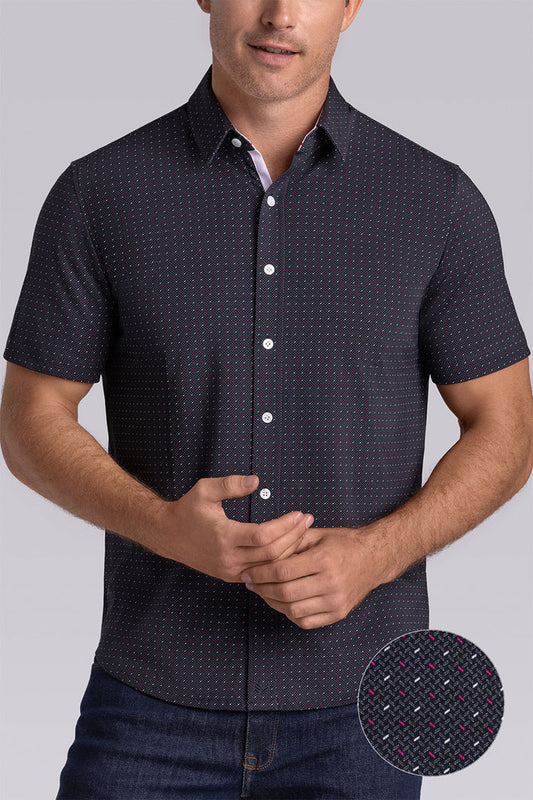 Model wearing Spark Black Icy Cotton® short sleeve classic collar shirt, styled with black pants