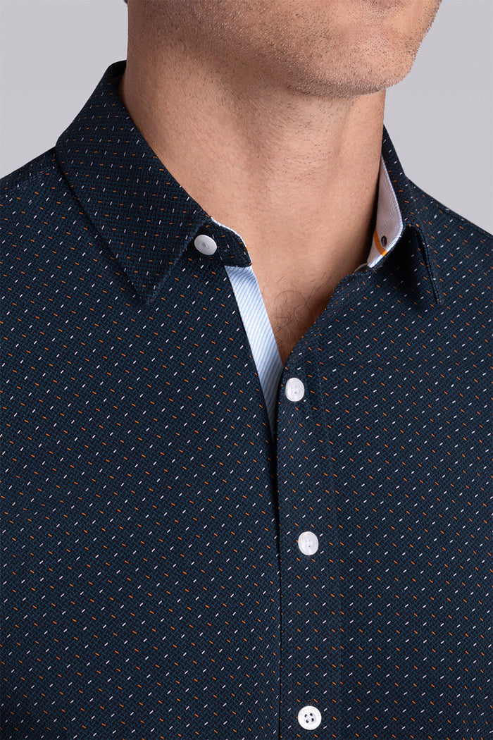 Model wearing Spark Monaco Blue Icy Cotton® short sleeve classic collar shirt, styled with white shorts