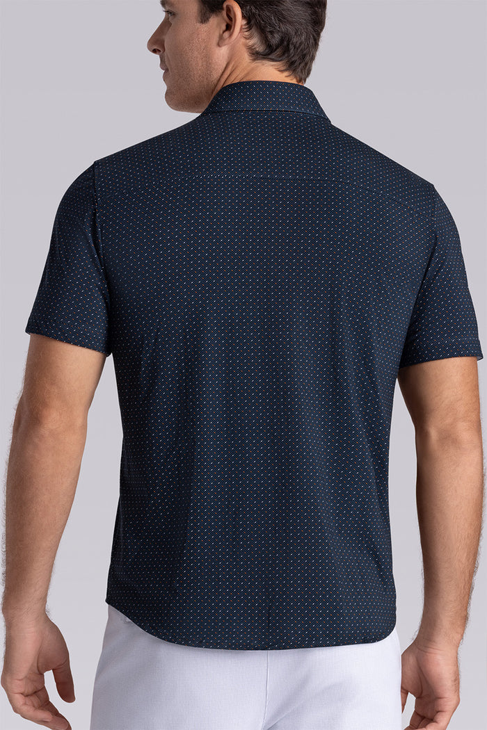 Model wearing Spark Monaco Blue Icy Cotton® short sleeve classic collar shirt, styled with white shorts
