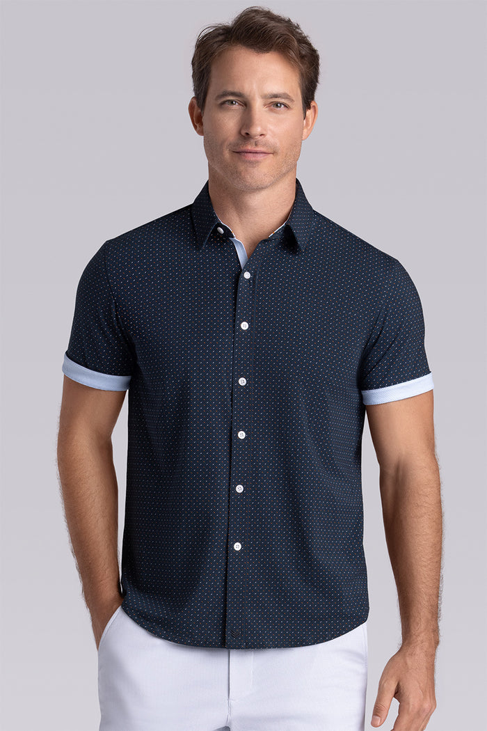 Model wearing Spark Monaco Blue Icy Cotton® short sleeve classic collar shirt, styled with white shorts