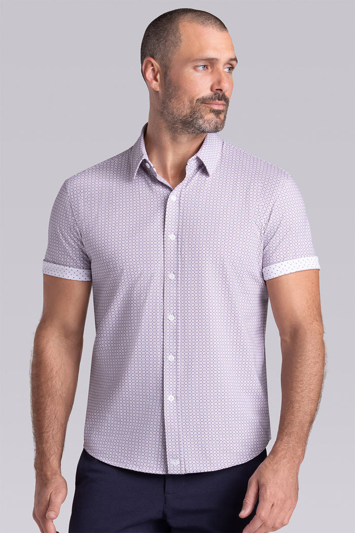 Model wearing Spectrum White Plum Icy Cotton® short sleeve classic collar shirt, styled with navy shorts