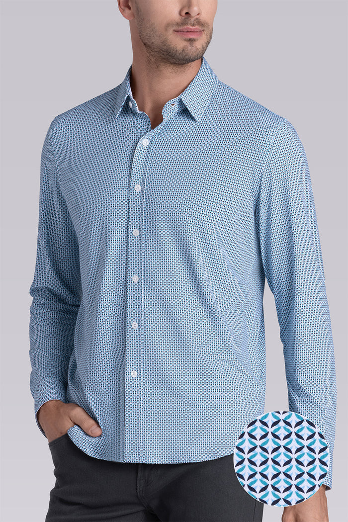 Model wearing Spry Seafoam long sleeve shirt with built in classic collar with geometric print, styled with jeans pants.