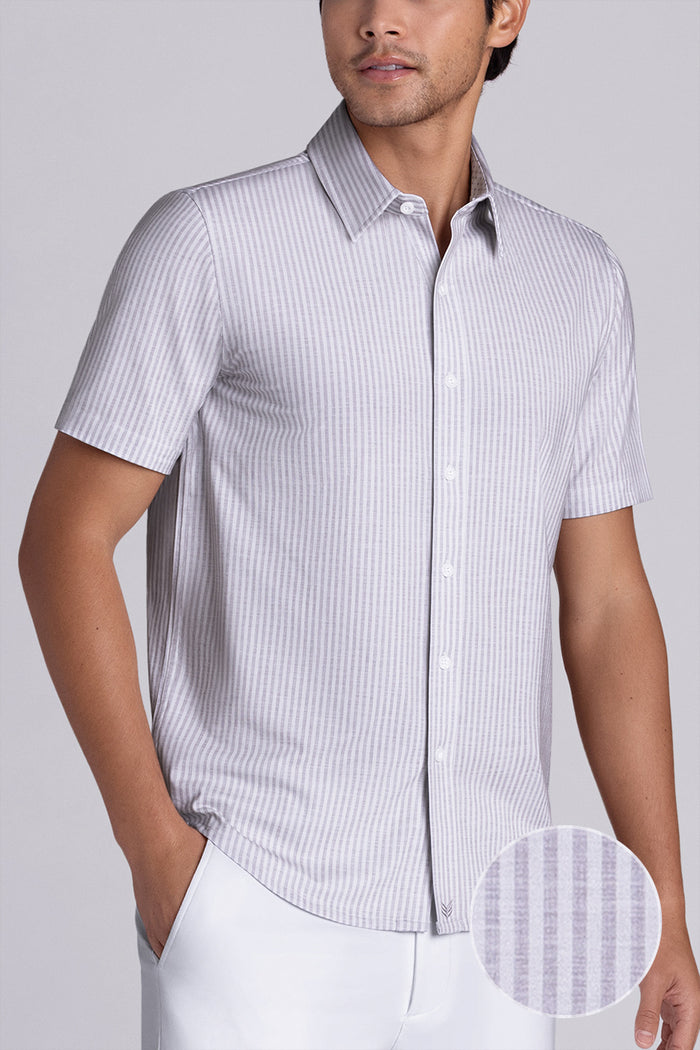 Model wearing Stamina Chateau Grey short sleeve classic collar, styled with white shorts