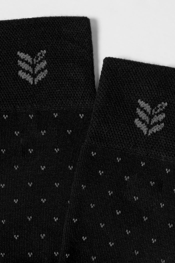 Model wearing Steps in Style calf length Socks Black Charcoal