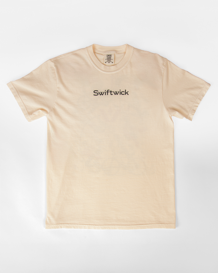 Beige t-shirt with Swiftwick logo on a white background