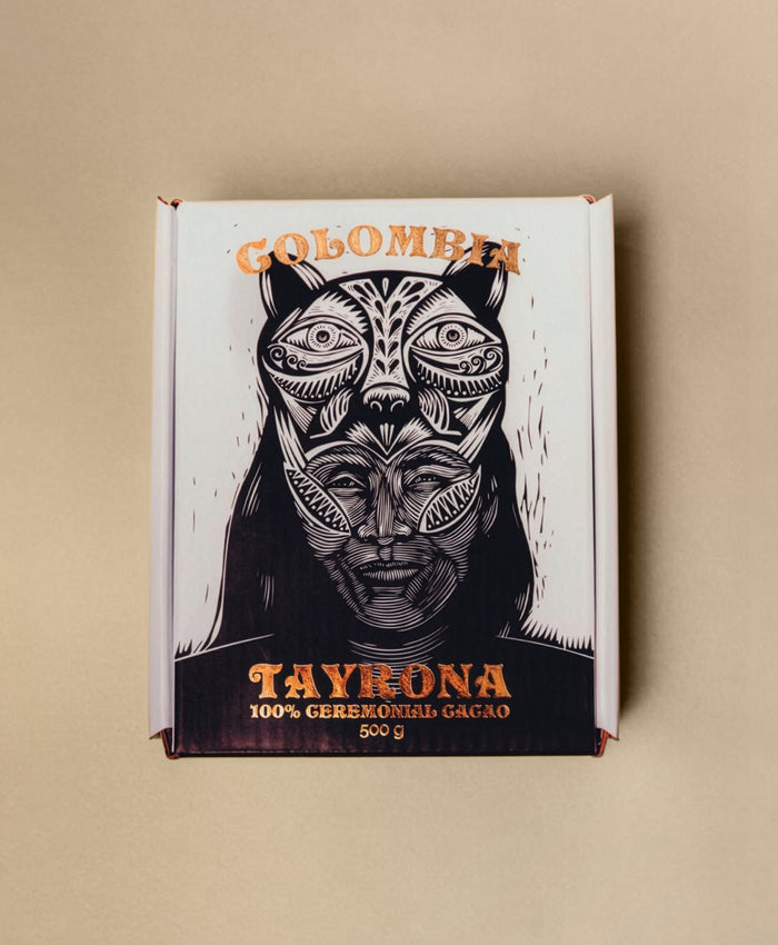 Cocoa packaging with a stylized animal face design on a beige background