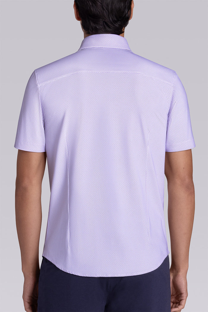 Model wearing Thrills Purple short sleeve classic collar, styled with navy shorts