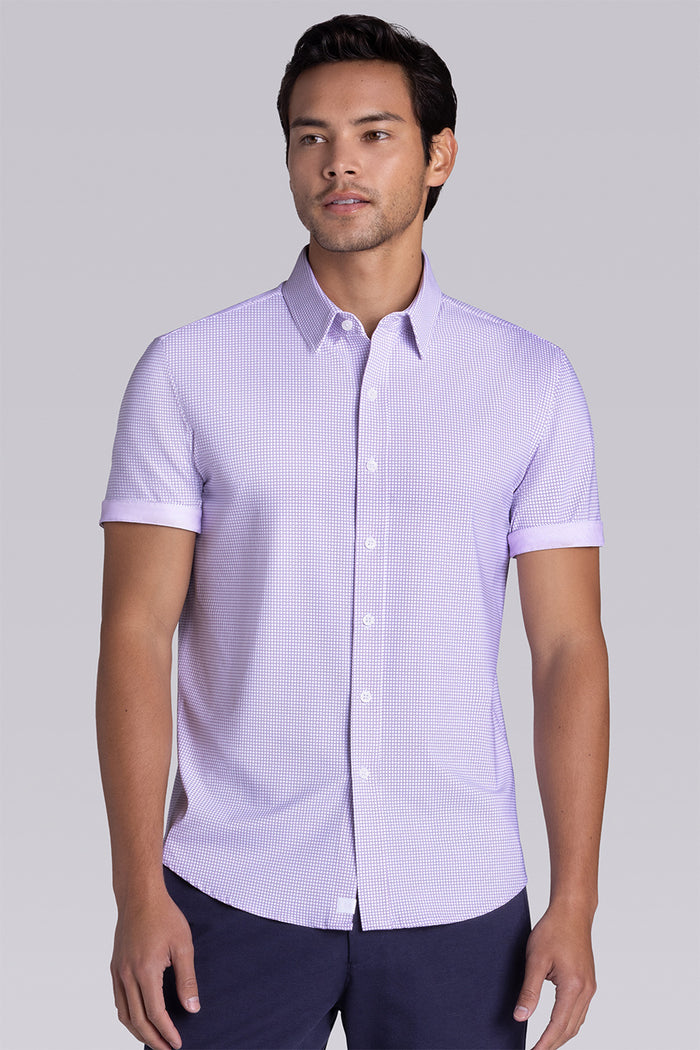 Model wearing Thrills Purple short sleeve classic collar, styled with navy shorts