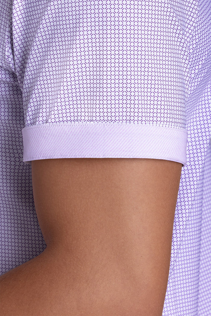 Model wearing Thrills Purple short sleeve classic collar, styled with navy shorts
