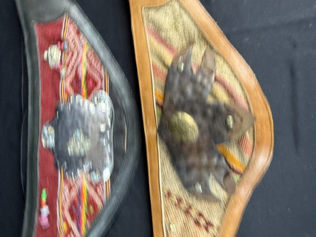 Two beautiful leather belts with handcrafted wool and metal designs