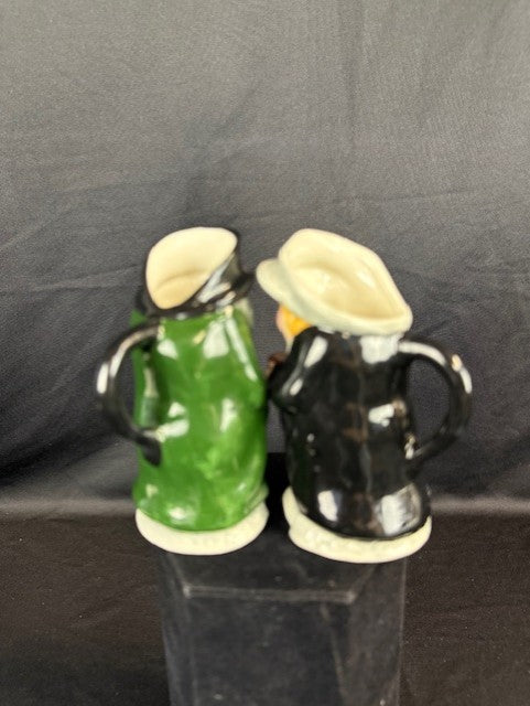 Two Staffordshire Character Jugs Dodger & Oliver