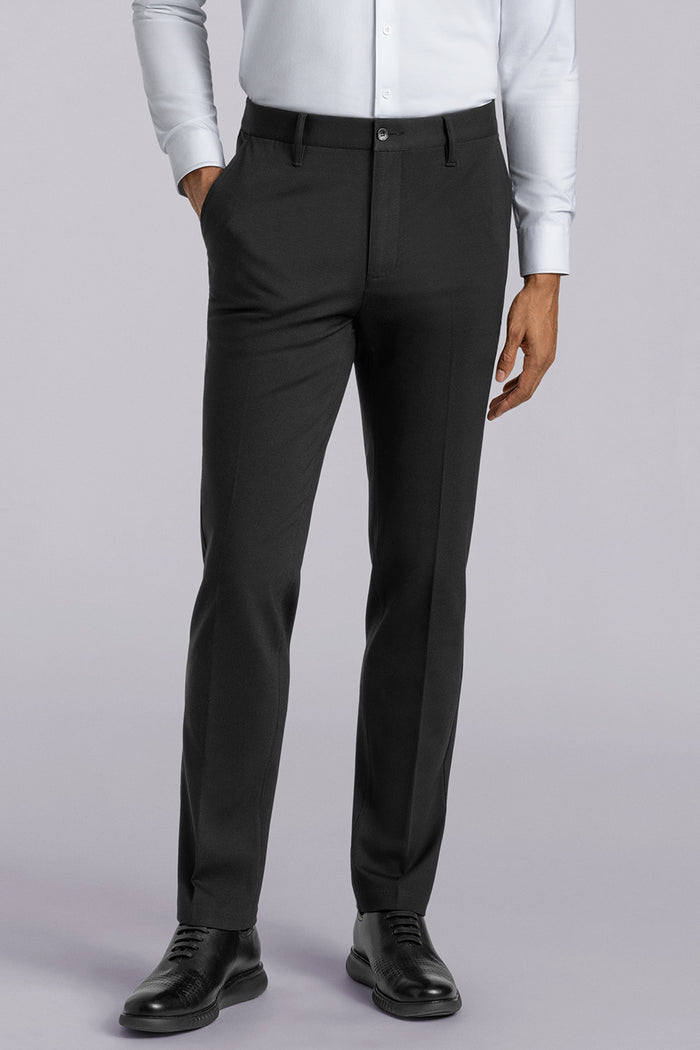 Model wearing Vigor Black Icy Knit mid rise pants, styled with white long sleeve shirt.