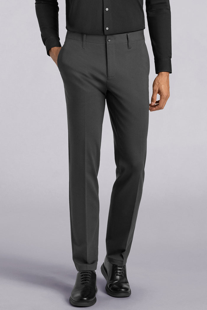 Model wearing Vigor Dark Charcoal Icy Knit mid rise pants, styled with black long sleeve shirt.