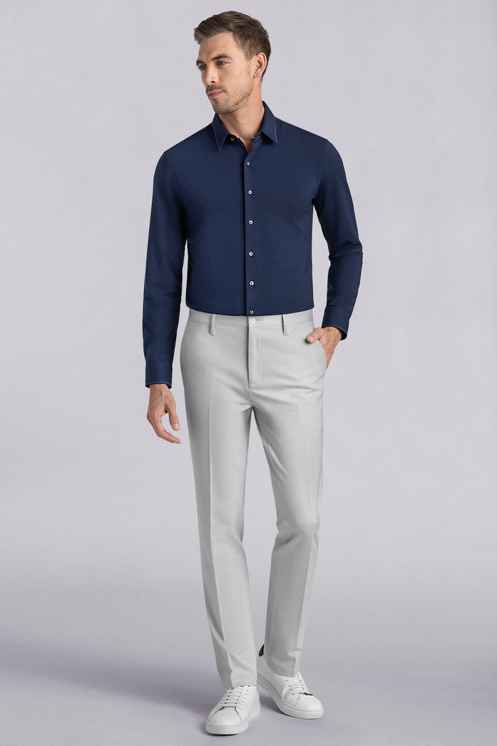 Model wearing Vigor Light Grey Icy Knit mid rise pants, styled with navy long sleeve shirt.