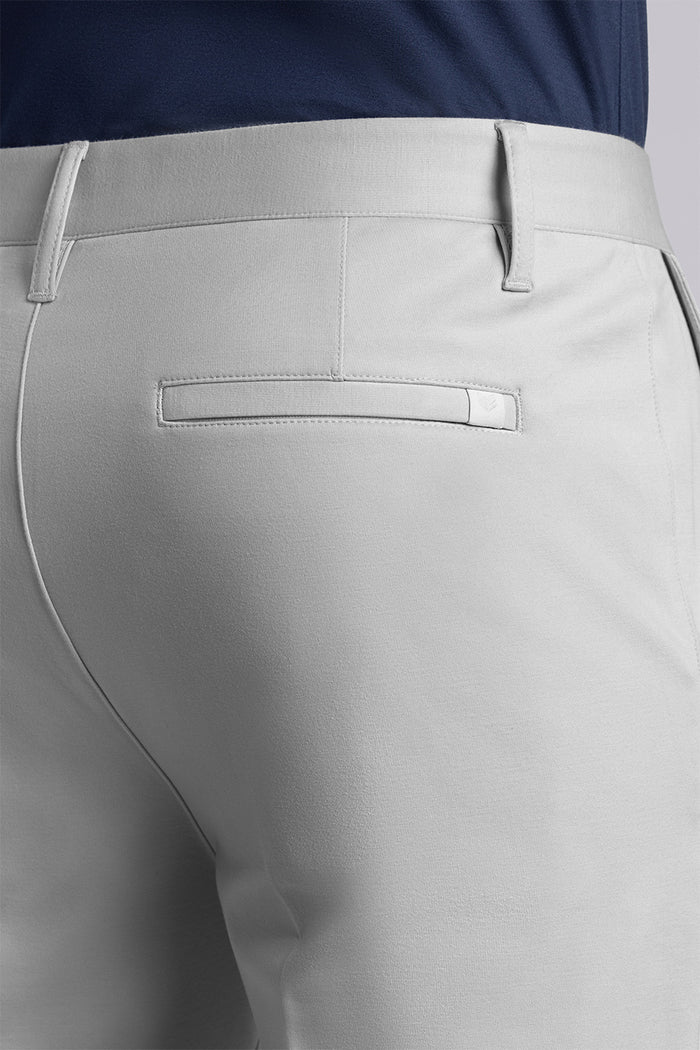 Model wearing Vigor Light Grey Icy Knit mid rise pants, styled with navy long sleeve shirt.