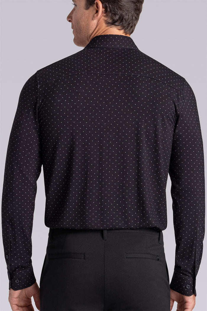 Model wearing Virtue Black Icy Bamboo® long sleeve classic collar shirt, styled with black pants.