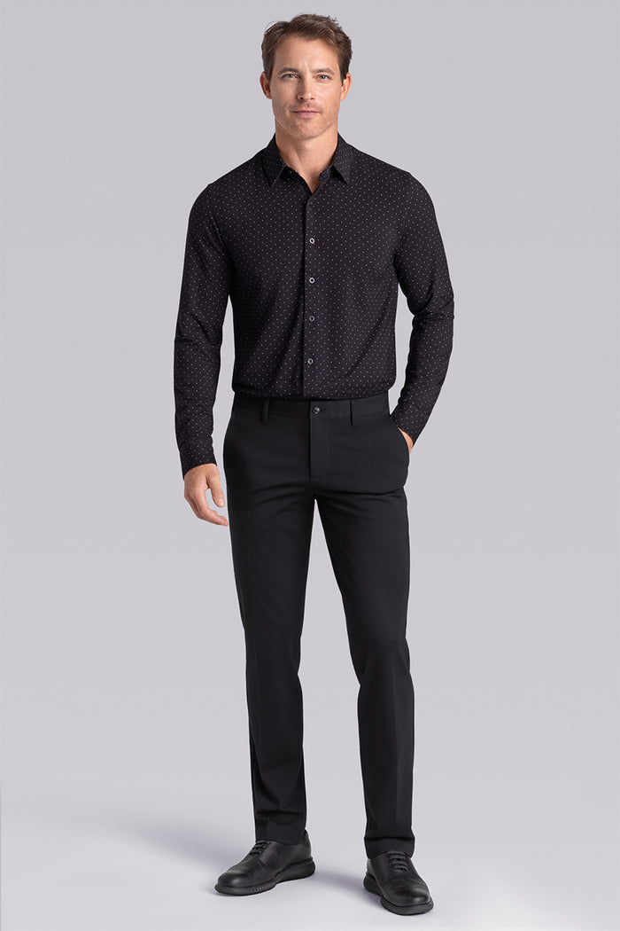 Model wearing Virtue Black Icy Bamboo® long sleeve classic collar shirt, styled with black pants.