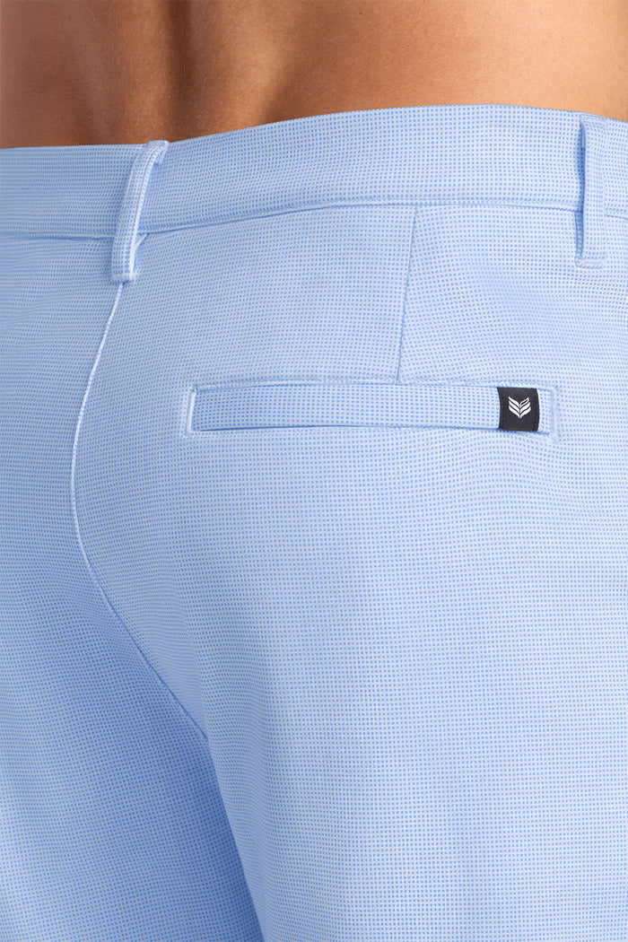 Model wearing Vision Light Blue Icy Cotton® mid rise shorts.