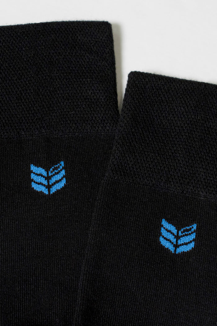 Model showcasing Walk This Way Socks Black Cyan comfortable socks ultra soft breathable long fiber cotton