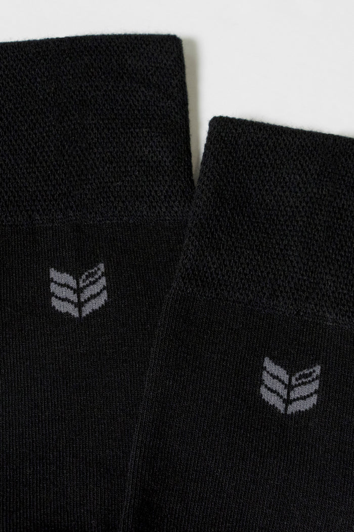 Model showcasing Walk This Way Socks Black comfortable socks ultra soft breathable long fiber cotton