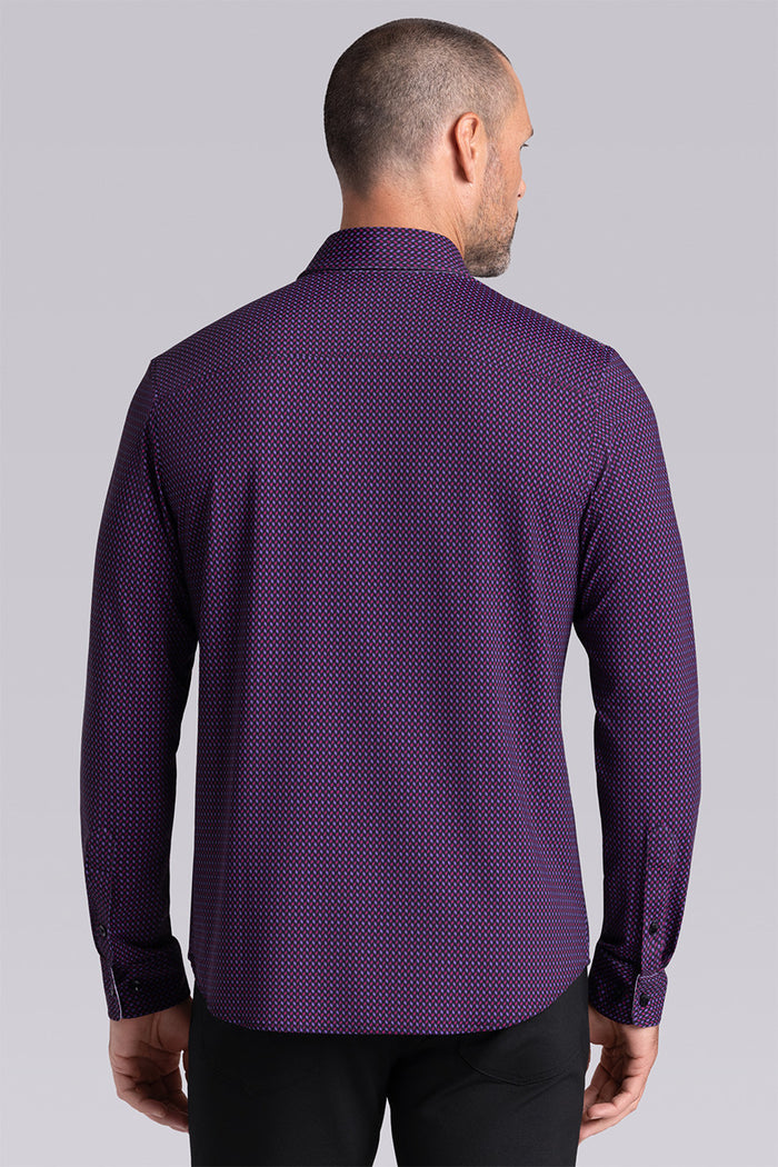 Model wearing Wavelength Dark Plum 6-WayKnit® long sleeve shirt classic collar, styled with black pants.