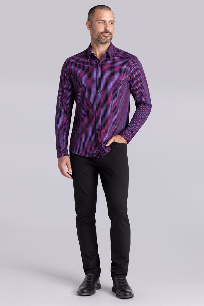 Model wearing Wavelength Dark Plum 6-WayKnit® long sleeve shirt classic collar, styled with black pants.