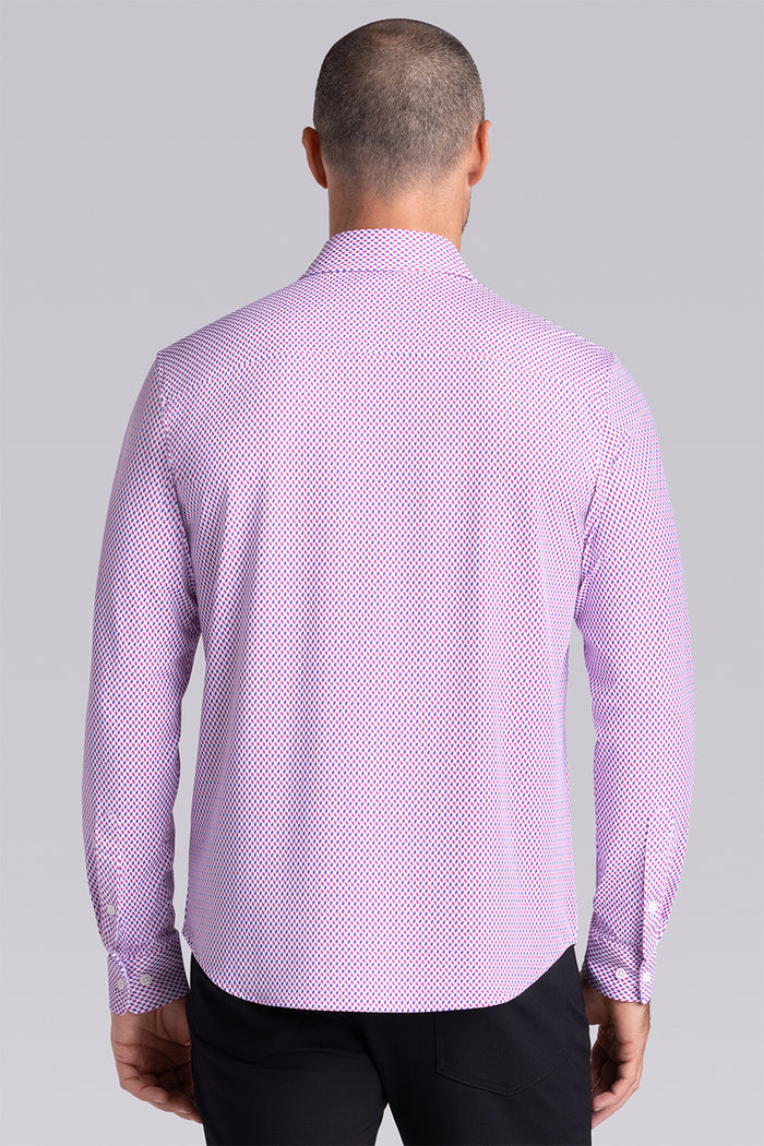 Model wearing Wavelength Magenta 6-WayKnit® long sleeve shirt classic collar, styled with black pants.