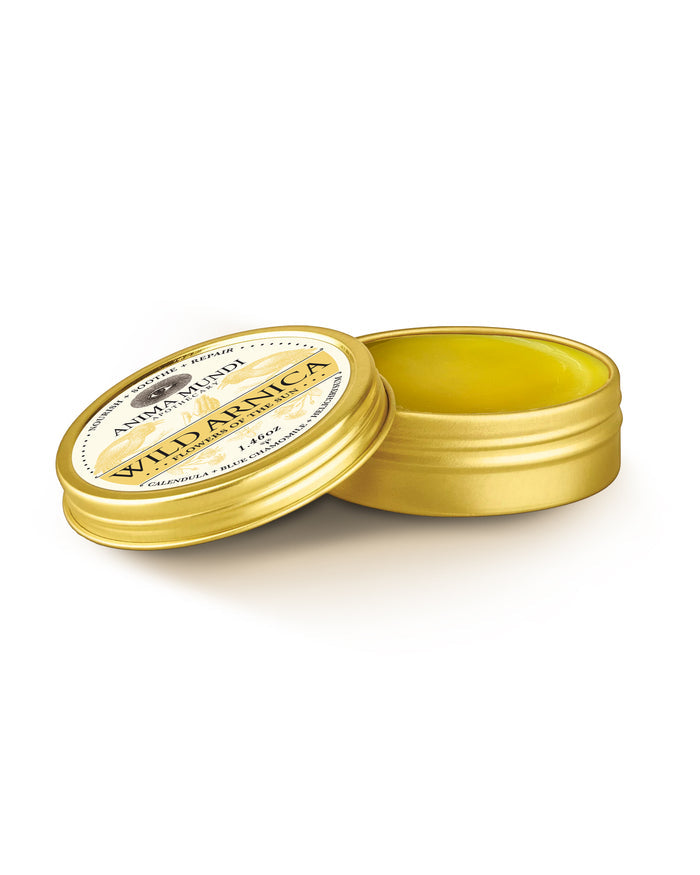 Two yellow tins with a visible label on a white background