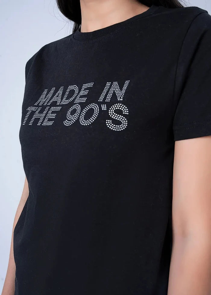 Women's black short-sleeve top, crew neck; 'MADE IN THE 90s' graphic on chest