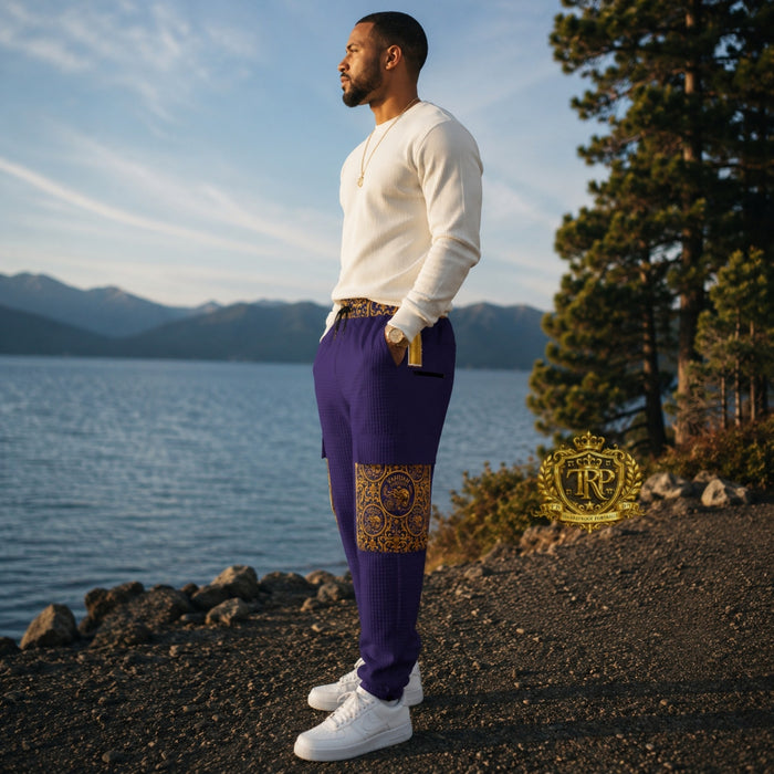 Left side profile view of a man wearing purple Yahuah Yahusha lantern cargo joggers featuring detailed pocket art.